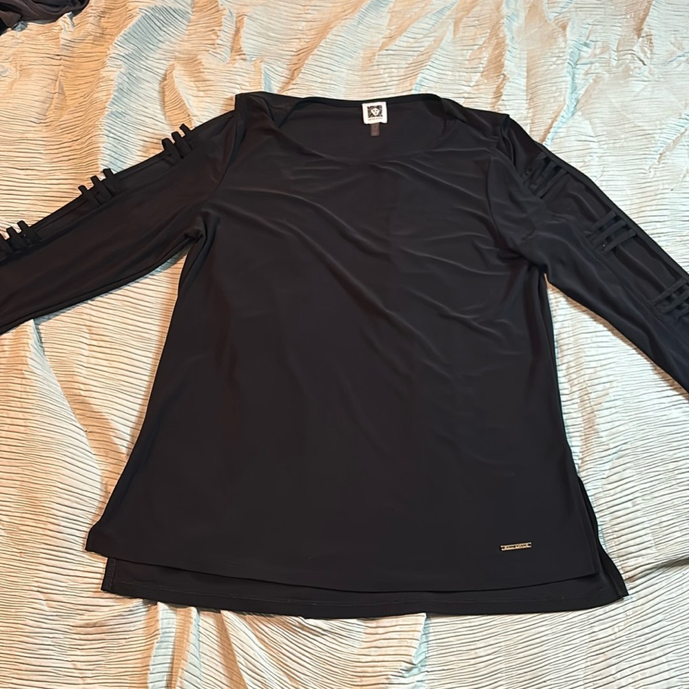 Black silk blouse.
